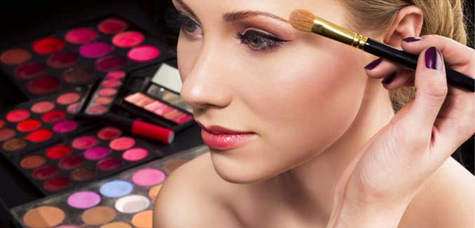 Makeup application of eyeshadow on a woman's face