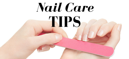 Hands following nail care tips by using a nail filer to shape nails